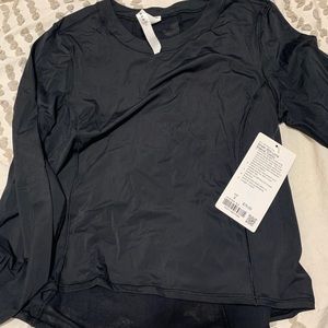 LULULEMON LONG SLEEVE NWT CAMO DETAIL ON BACK SZ 8